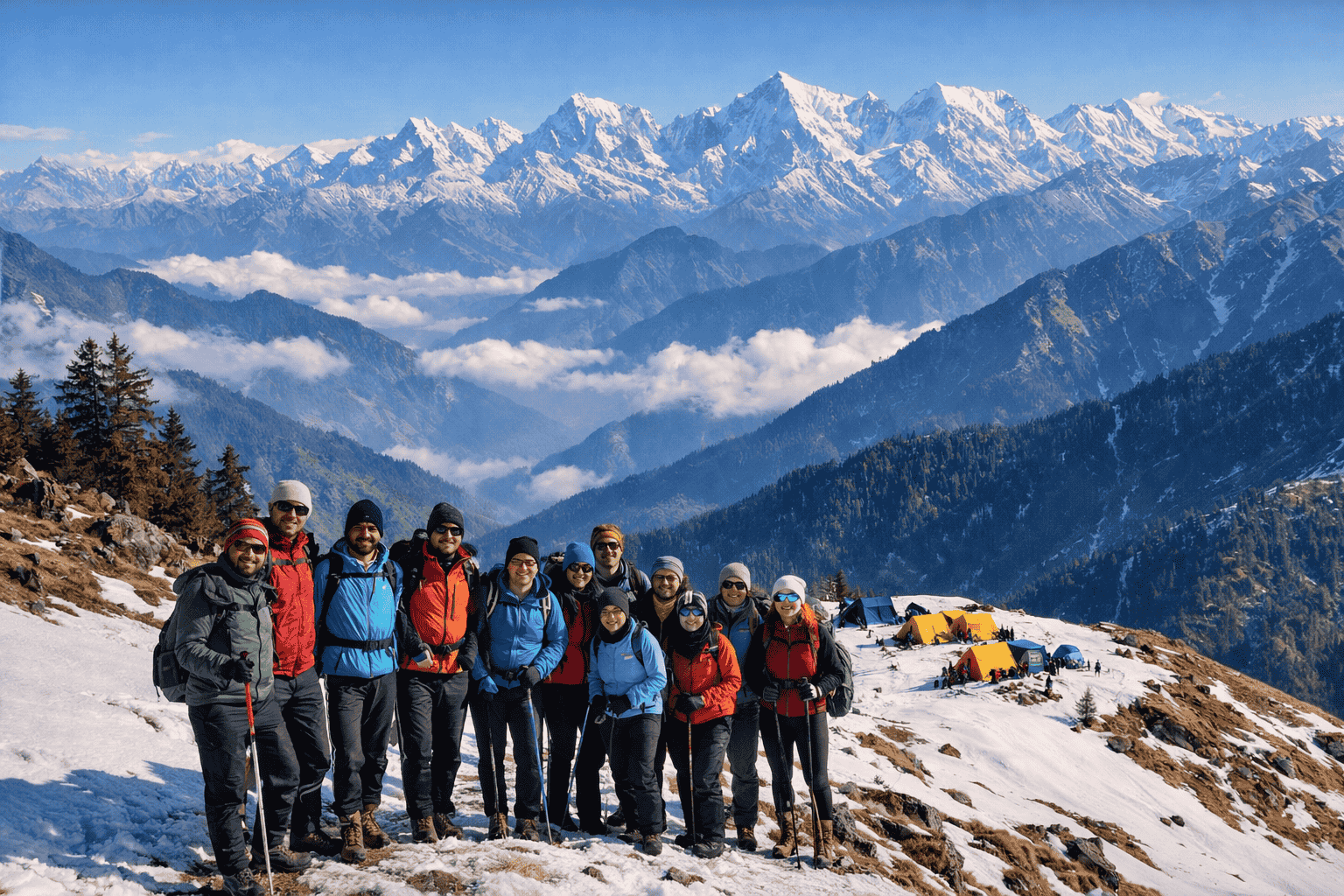Kedarkantha trek group photo with trekkers posing on a snowy ridge and Himalayan peaks in the background